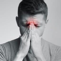 Black and white photo indicating nasal damage on a man.